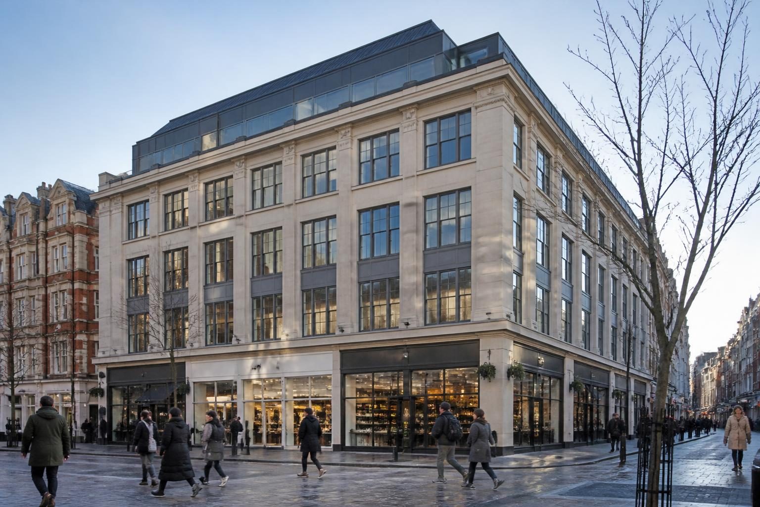 A mixed use building with ground floor shops and offices above in a UK town centre