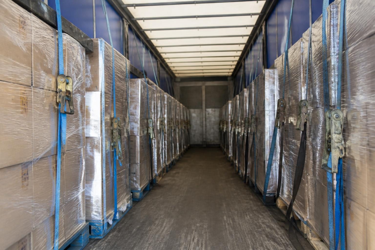 Goods in Transit Insurance 2 The inside of a lorry trailer loaded with strapped pallets of goods